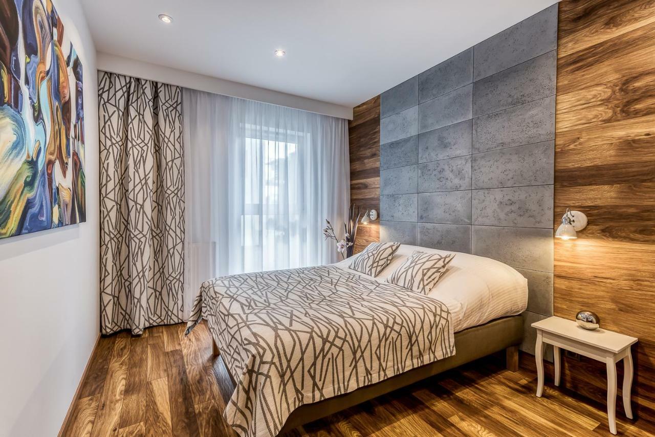 Apartament Merkury Z Parkingiem ทอรูน ภายนอก รูปภาพ